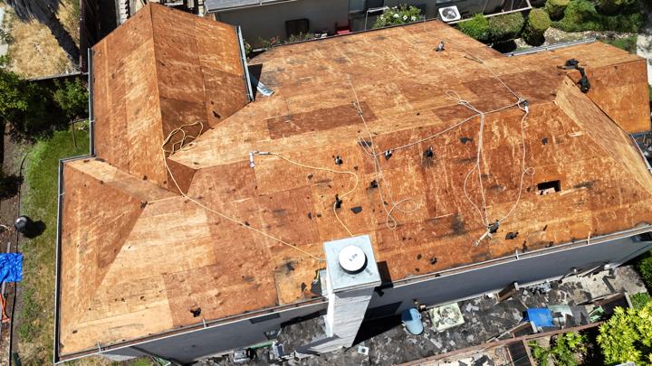 Roof deck exposed during a Precise Roofing tear off