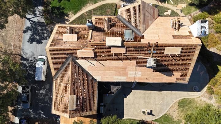 Bare deck, every sheet checked by Precise Roofing