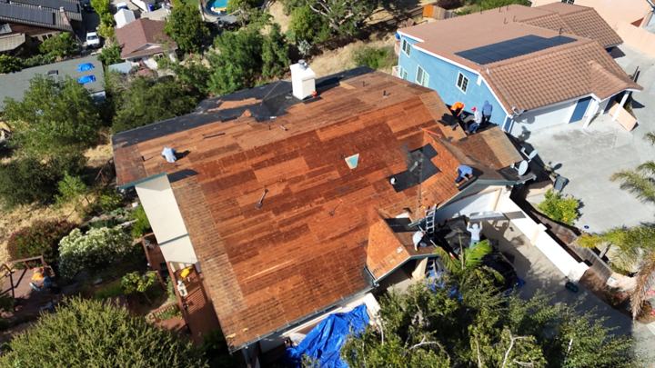 Decking crew at work by Precise Roofing